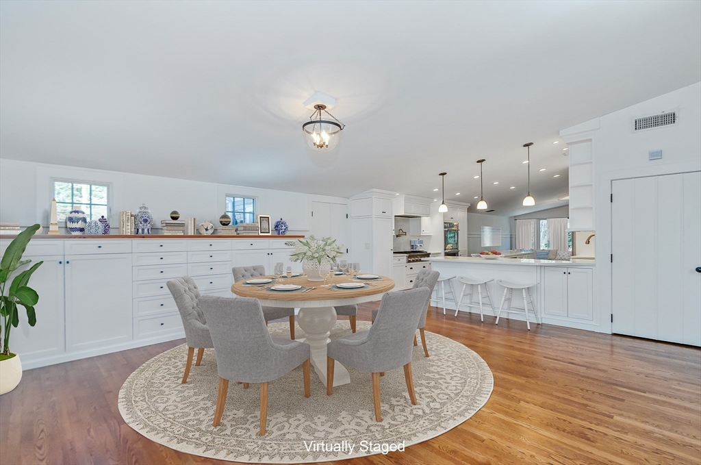 345 Point Road Marion, MA 02738 - Photo 7 of 41 a dining room with furniture and wooden floor
