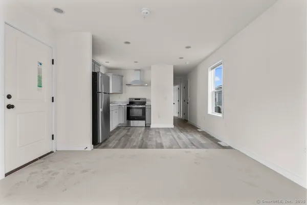 a view of kitchen and windows