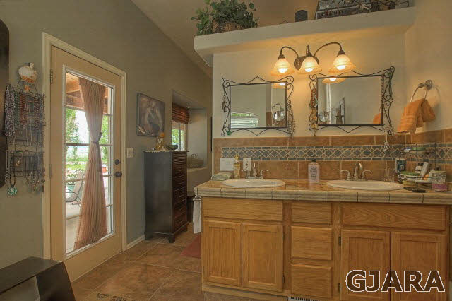 1701 10 Road Mack, CO 81525 - Photo 8 of 25 a bathroom with a sink and a mirror
