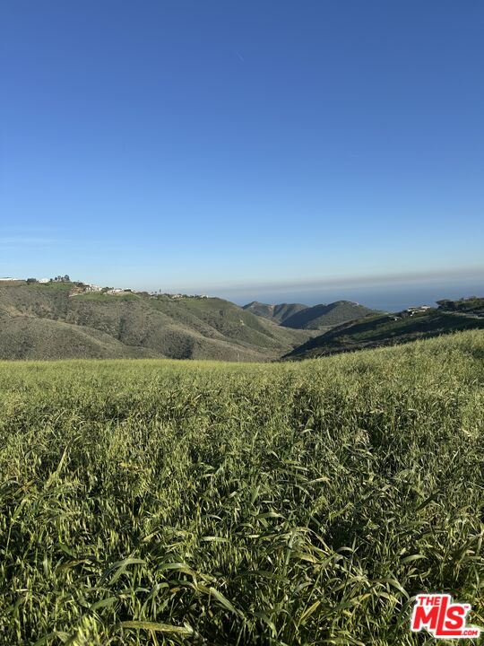 5797 Murphy Way Malibu, CA 90265 - Photo 2 of 6 a view of an outdoor space and a lake view