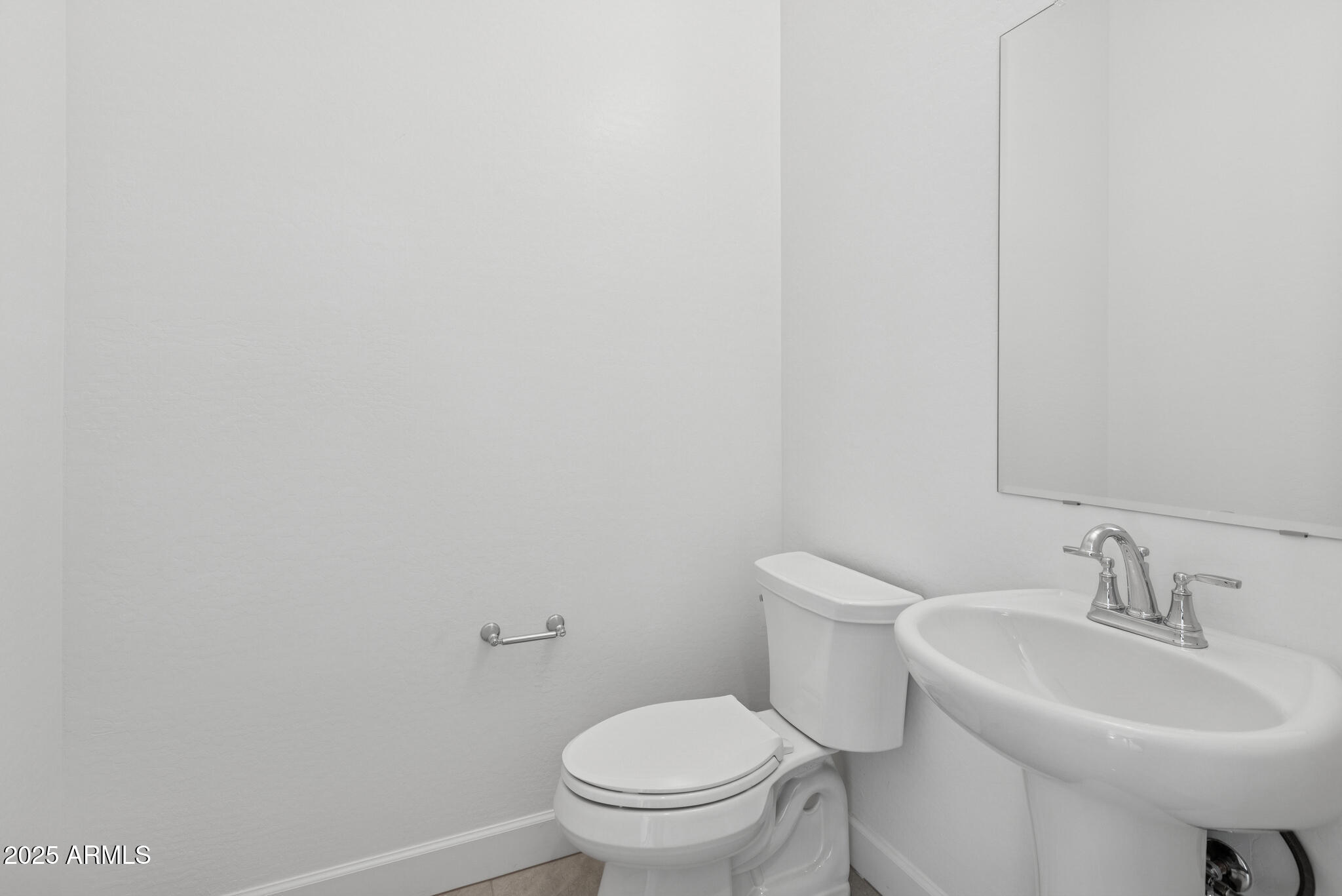 1110 West J. Waltz Way Apache Junction, AZ 85120 - Photo 20 of 32 a bathroom with a sink toilet and a mirror