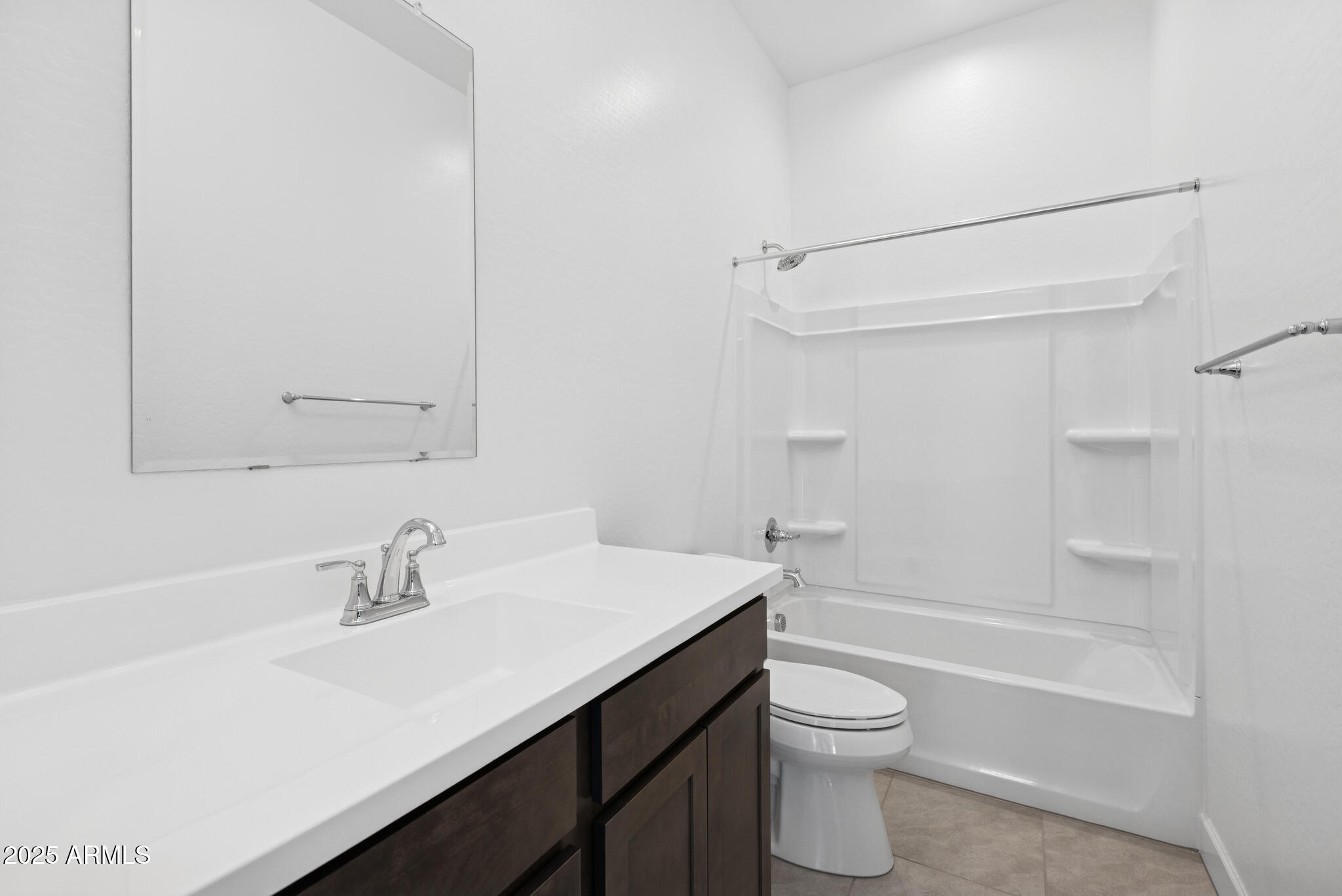 1110 West J. Waltz Way Apache Junction, AZ 85120 - Photo 21 of 32 a bathroom with a sink a toilet and shower