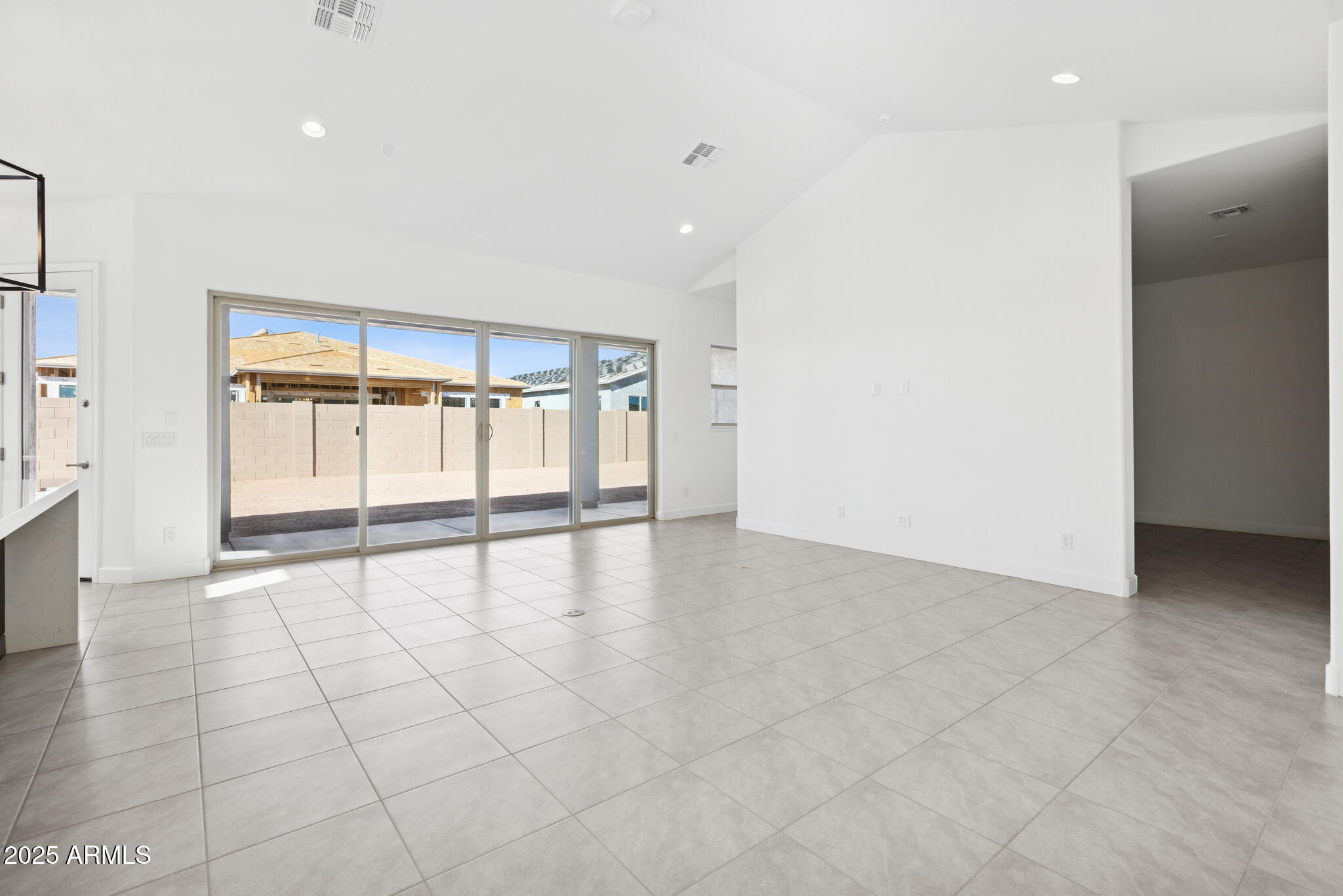 1110 West J. Waltz Way Apache Junction, AZ 85120 - Photo 3 of 32 a view of an empty room with a window