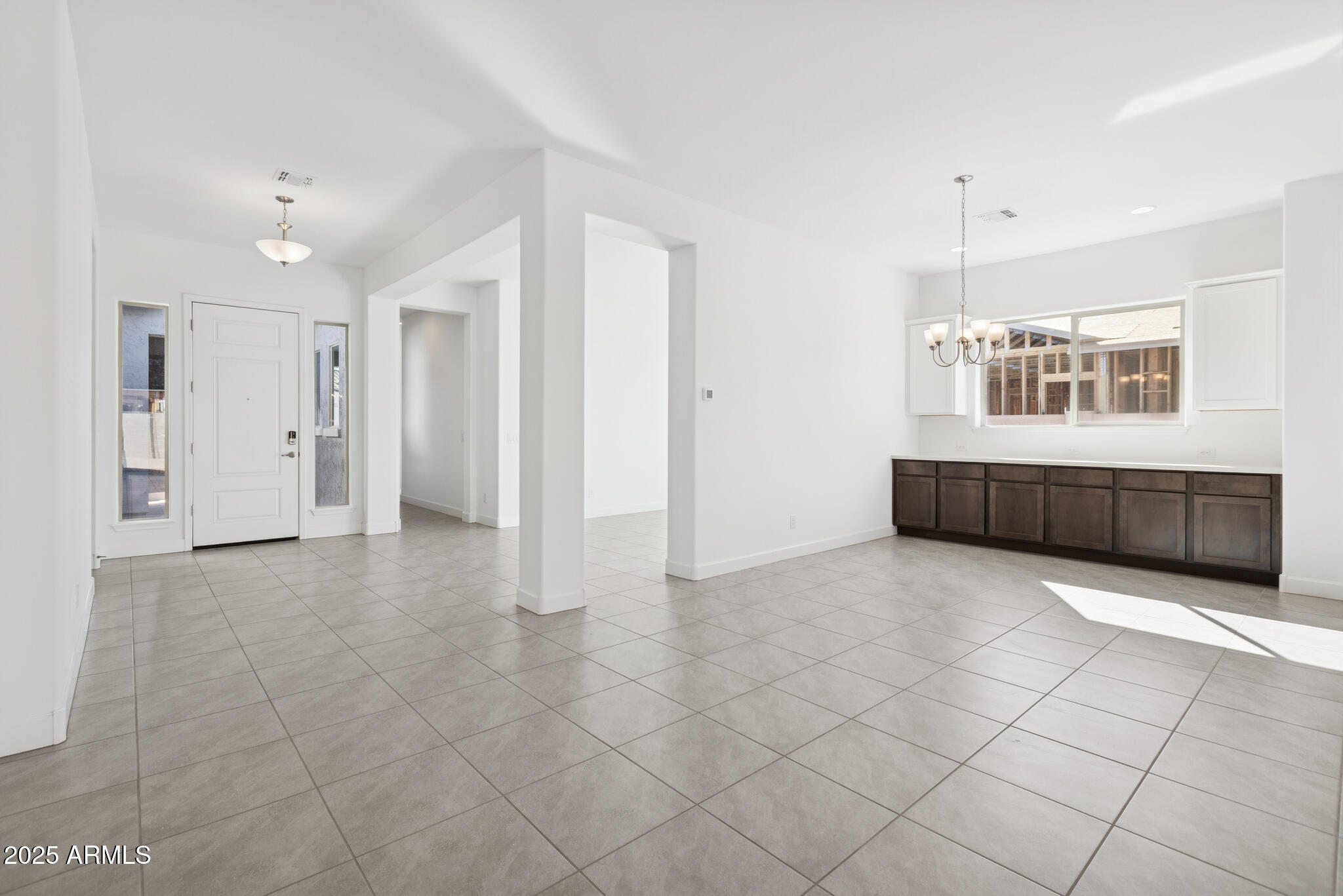 1110 West J. Waltz Way Apache Junction, AZ 85120 - Photo 8 of 32 a view of livingroom with furniture and windows
