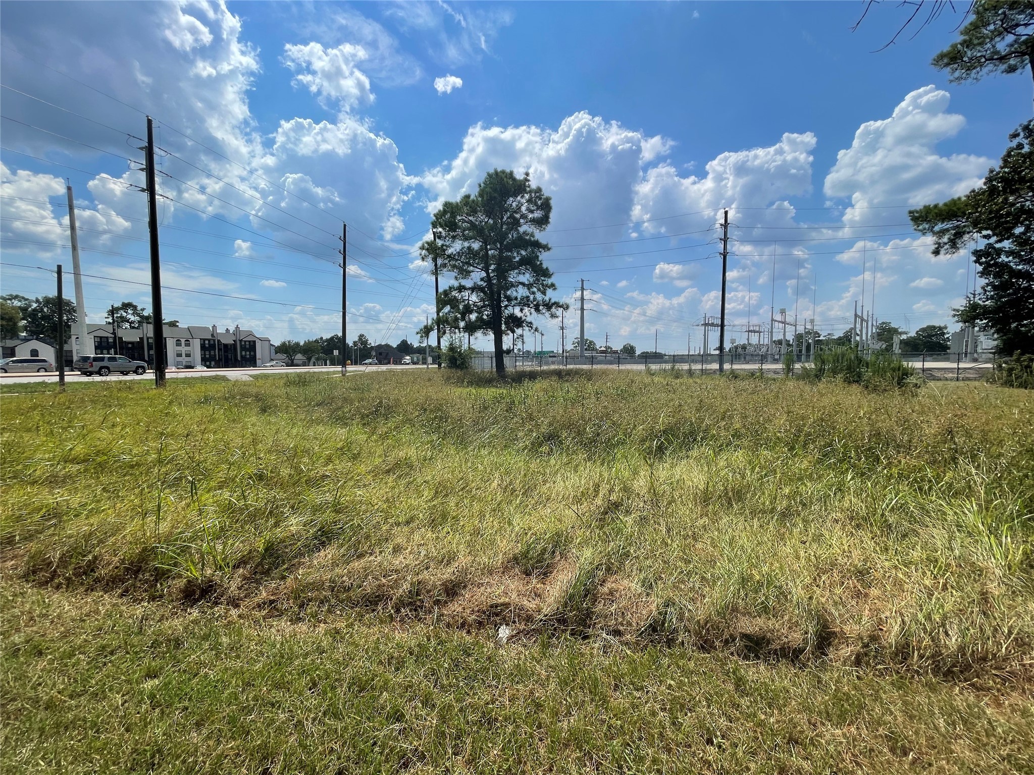 7927 Fm 1960 Road East Humble, TX 77346 - Photo 10 of 13 a view of a big yard with a fountain