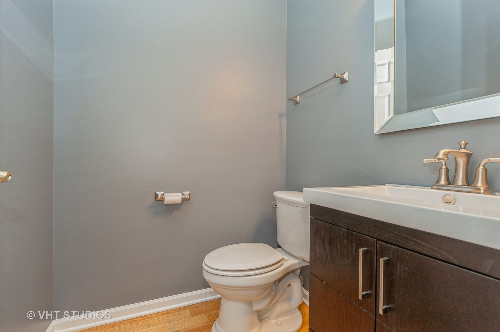 360 Bay Tree Circle Vernon Hills, IL 60061 - Photo 17 of 18 a bathroom with a sink a toilet and mirror