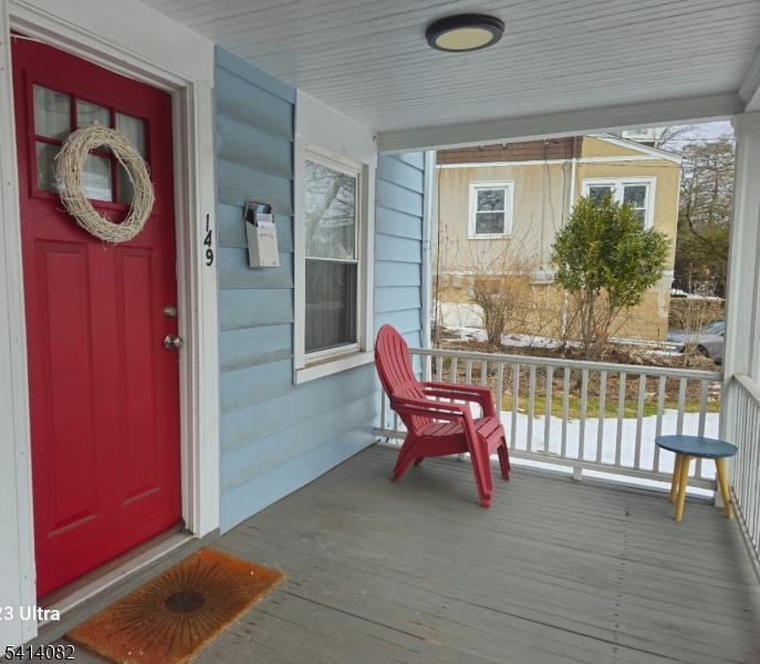 149 Broad Street Summit, NJ 07901 - Photo 12 of 12 a balcony with furniture and wooden floor