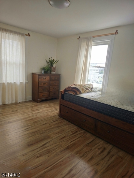 149 Broad Street Summit, NJ 07901 - Photo 5 of 12 a bedroom with a bed and window