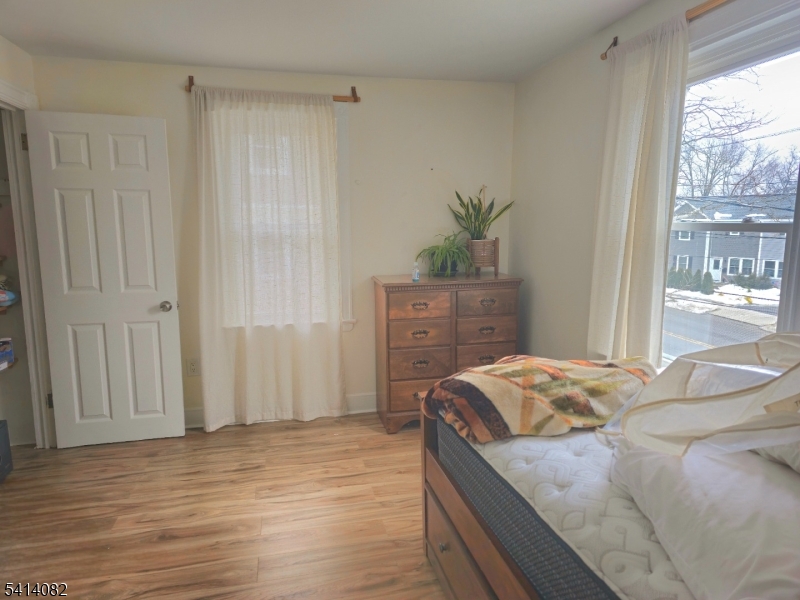 149 Broad Street Summit, NJ 07901 - Photo 6 of 12 a bedroom with a bed and a dresser