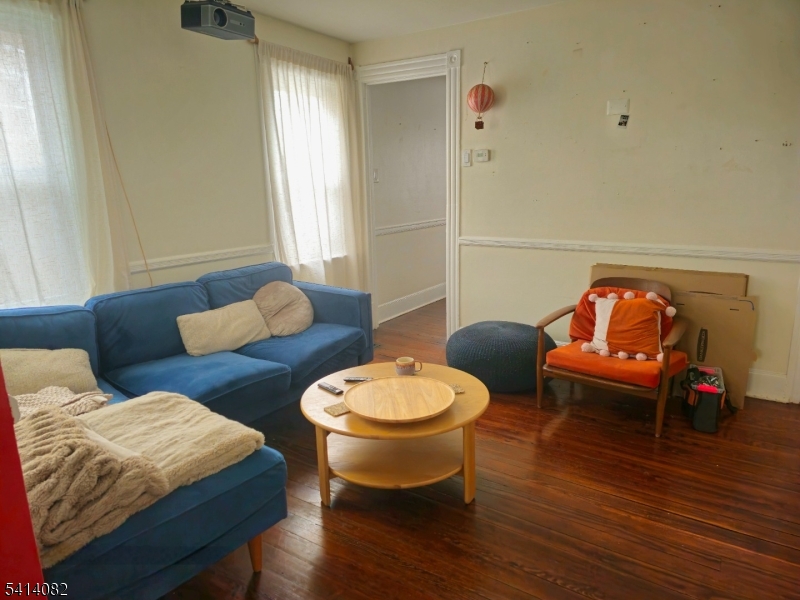 149 Broad Street Summit, NJ 07901 - Photo 7 of 12 a living room with furniture and a wooden floor