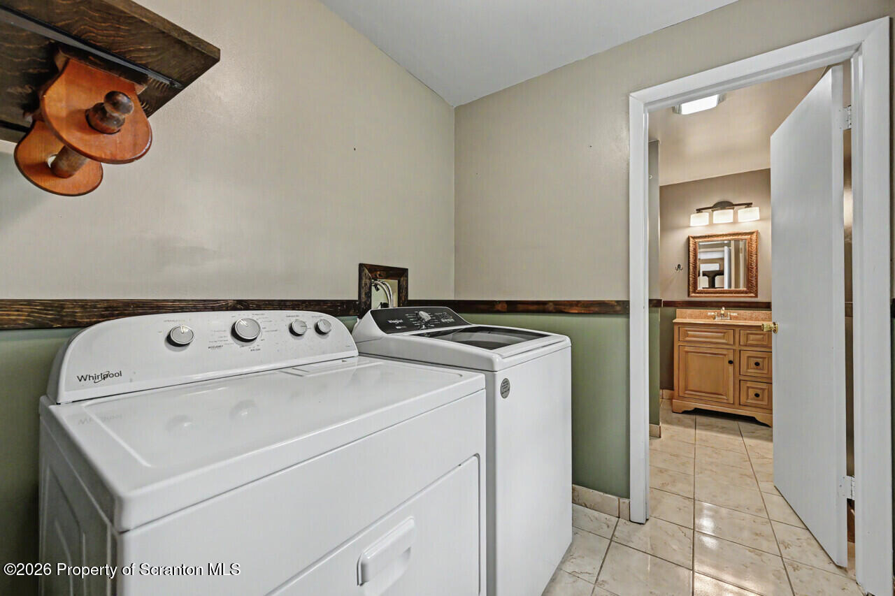 211 Buckingham Street Moscow, PA 18444 - Photo 56 of 83 a utility room with dryer and washer