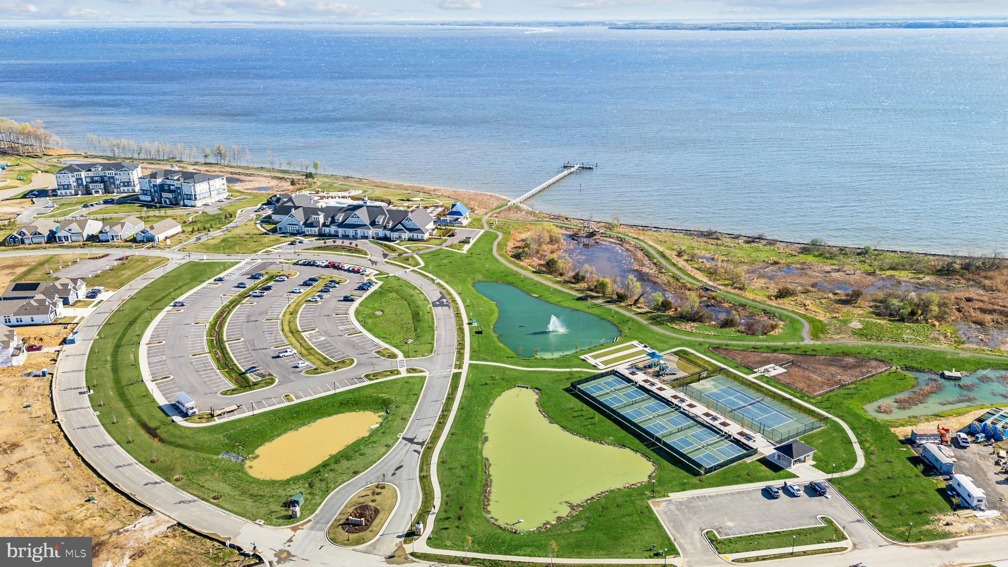 170 Harrier Way, Unit 34 Chester, MD 21619 - Photo 38 of 81 an aerial view of a swimming pool and outdoor space