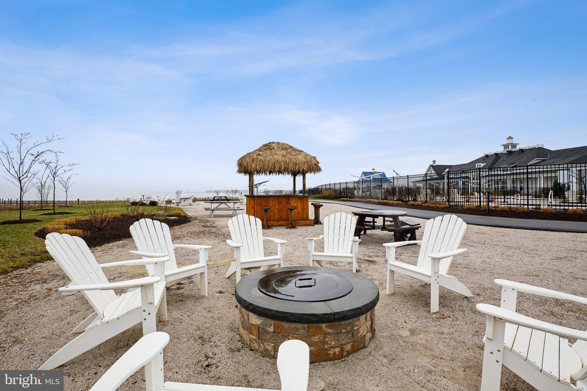 170 Harrier Way, Unit 34 Chester, MD 21619 - Photo 54 of 81 a view of a chairs and table in patio