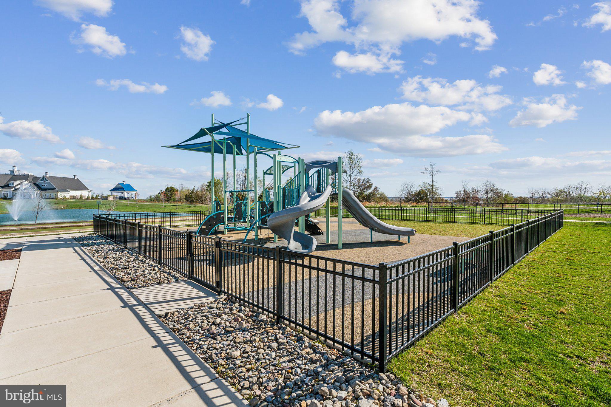 170 Harrier Way, Unit 34 Chester, MD 21619 - Photo 72 of 81 a view of a balcony with wooden floor