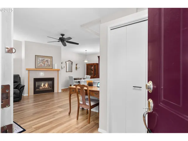 a view of a livingroom with furniture and a fireplace