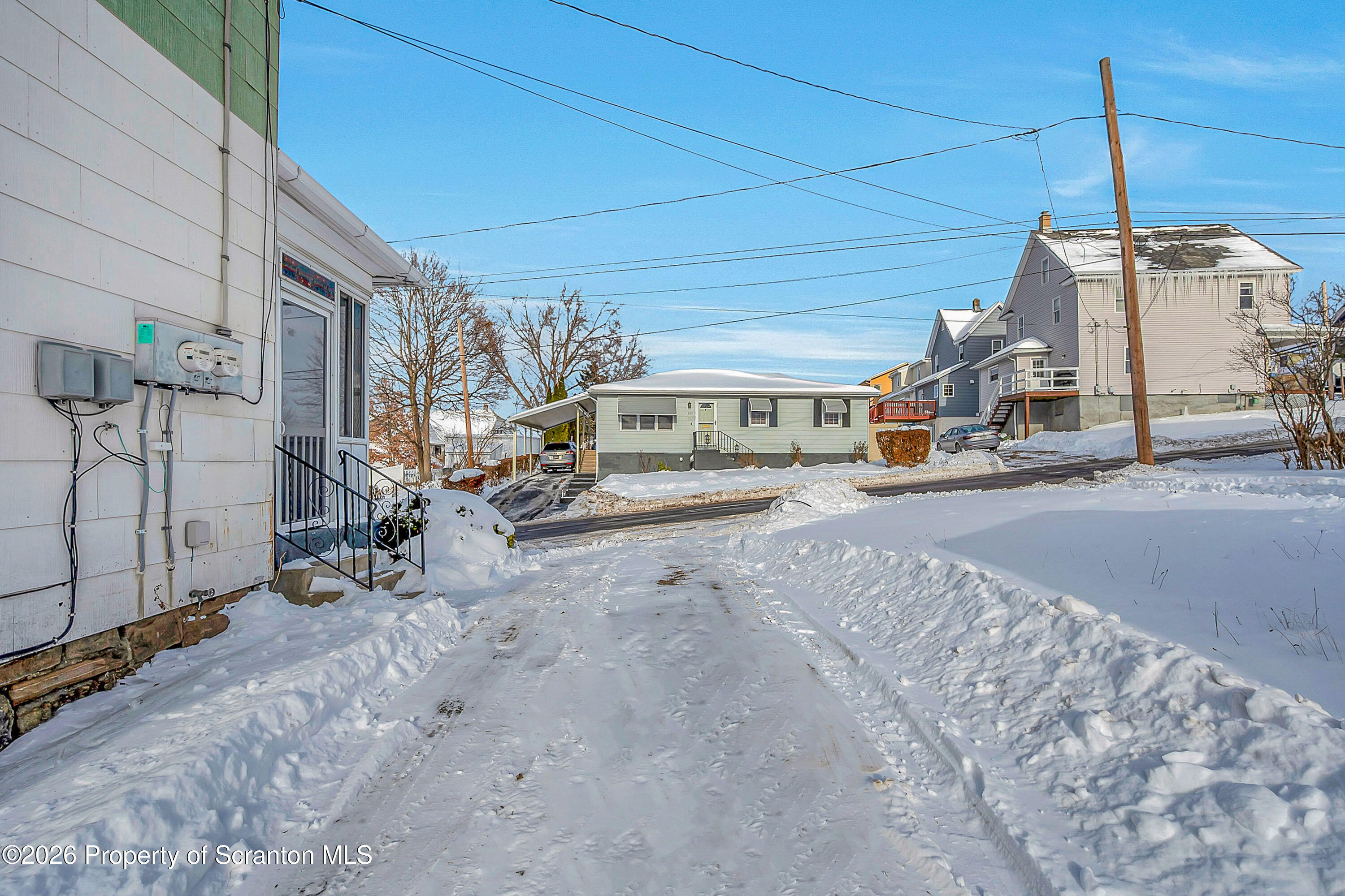 208 East Warren Street, Unit 1 Dunmore, PA 18512 - Photo 3 of 18 a view of a street with a building