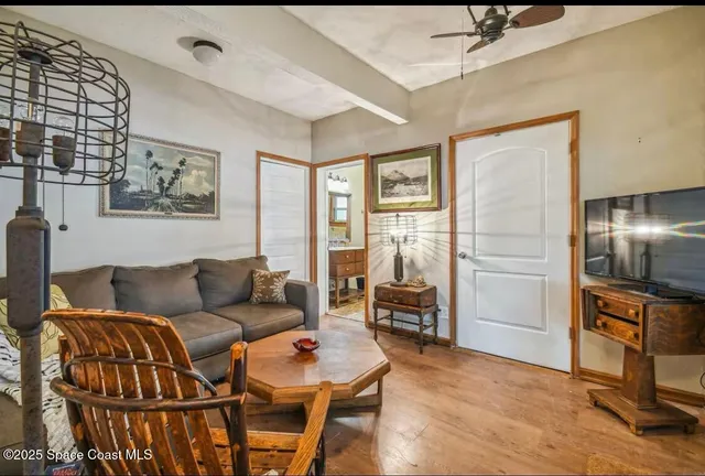 a bathroom with a toilet a sink and a mirror