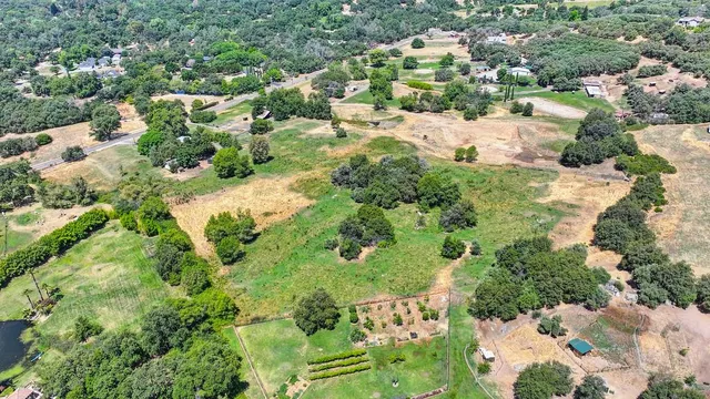a view of a field with an outdoor space