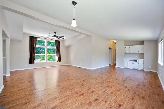 a view of outdoor space with deck and yard