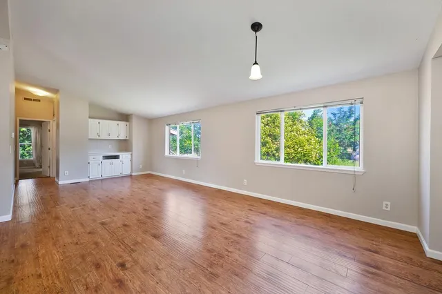 a view of lake with green space