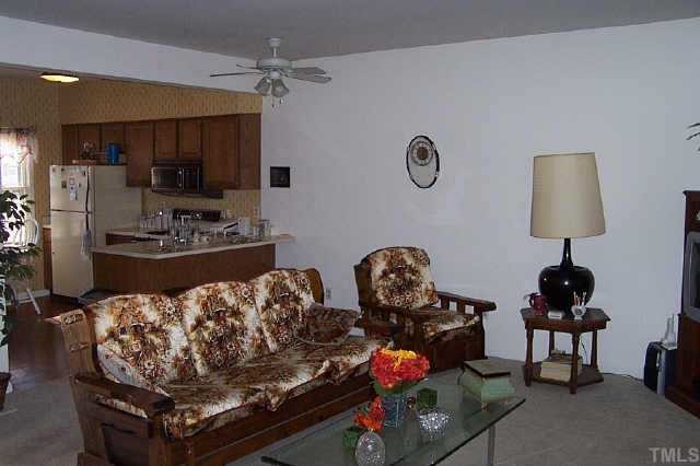 6151 Bushmills Street Raleigh, NC 27613 - Photo 4 of 10 a living room with furniture