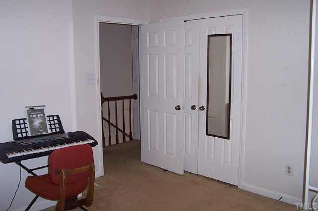 6151 Bushmills Street Raleigh, NC 27613 - Photo 10 of 10 a view of a hallway with workspace