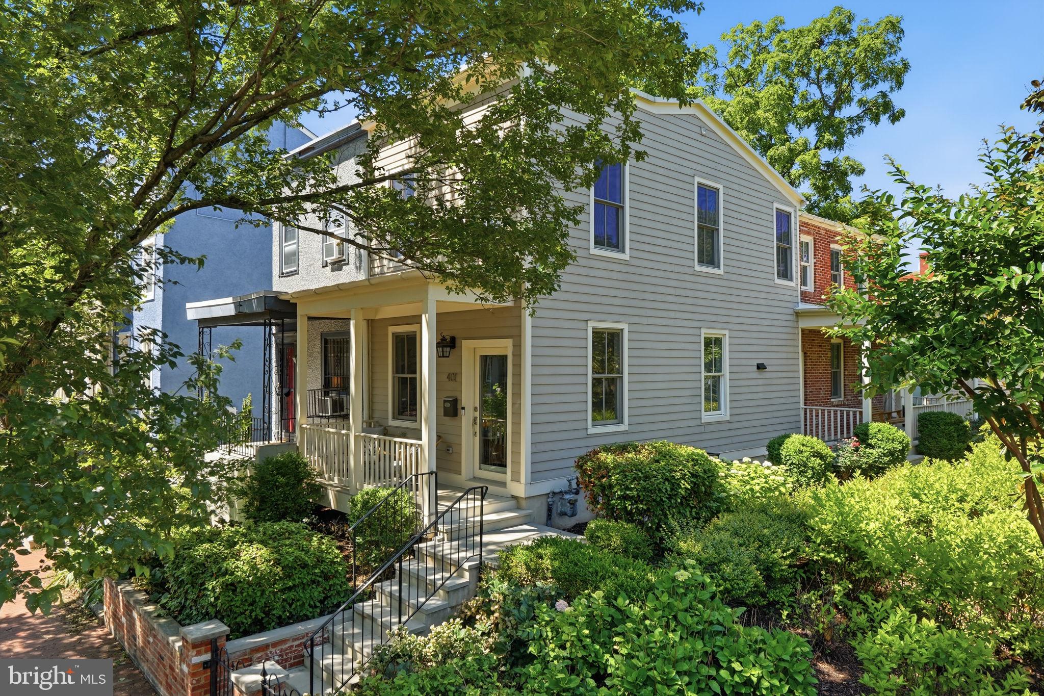 Capitol Hill corner rowhome with lush landscaping