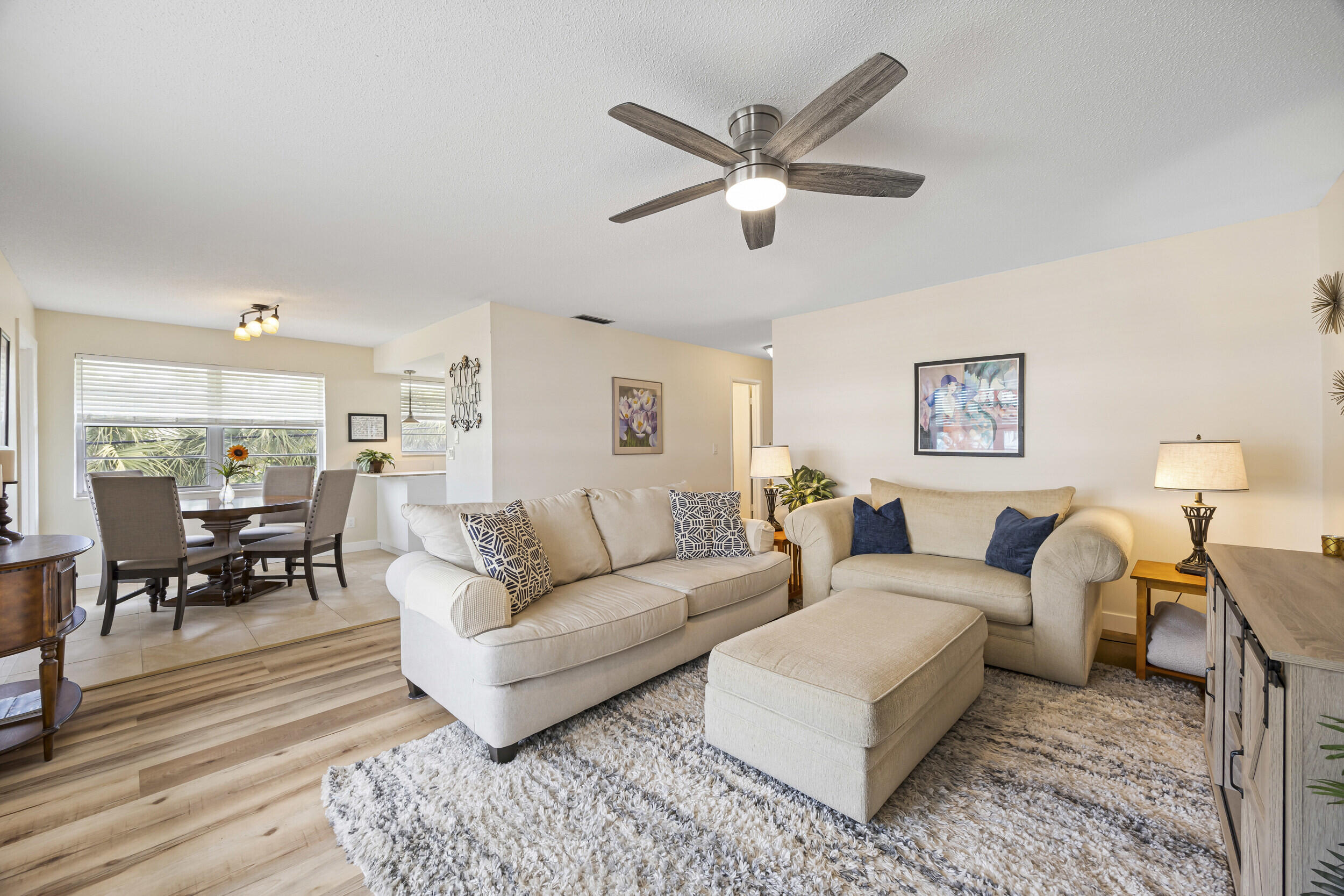 a living room with furniture and a view of living room