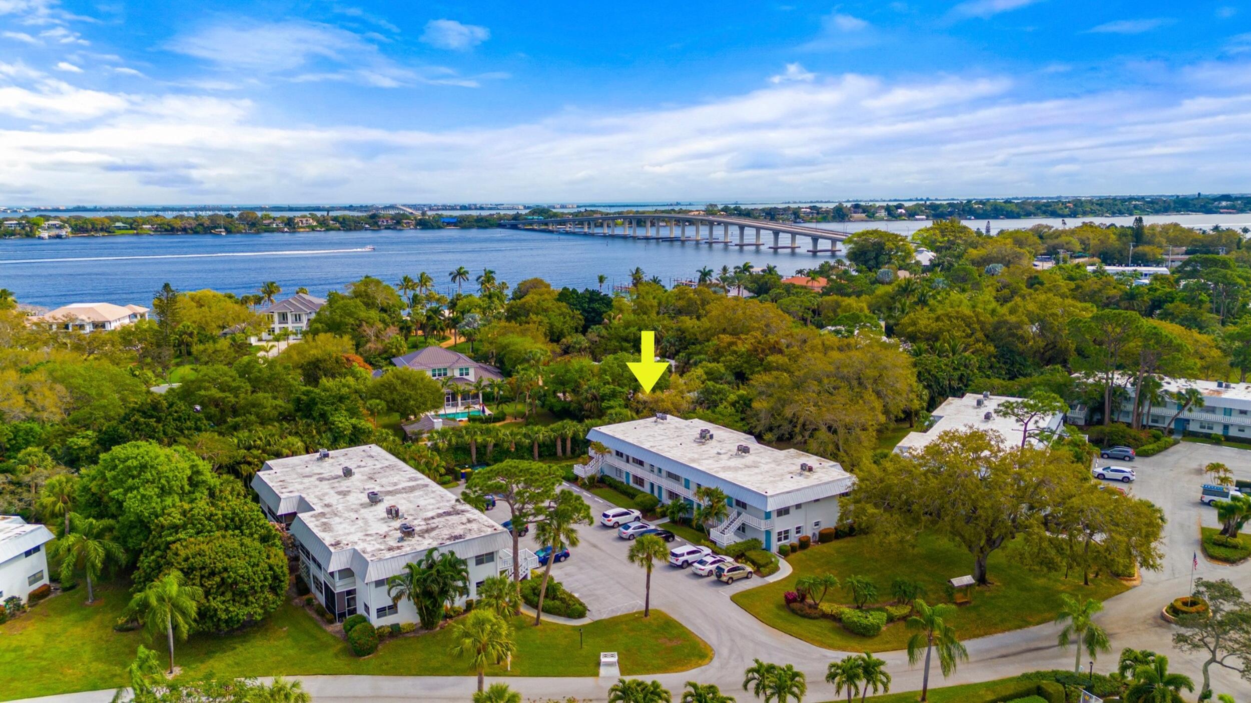 2929 Southeast Ocean Boulevard, Unit 10510 Stuart, FL 34996 - Photo 32 of 37 an aerial view of a house with a garden