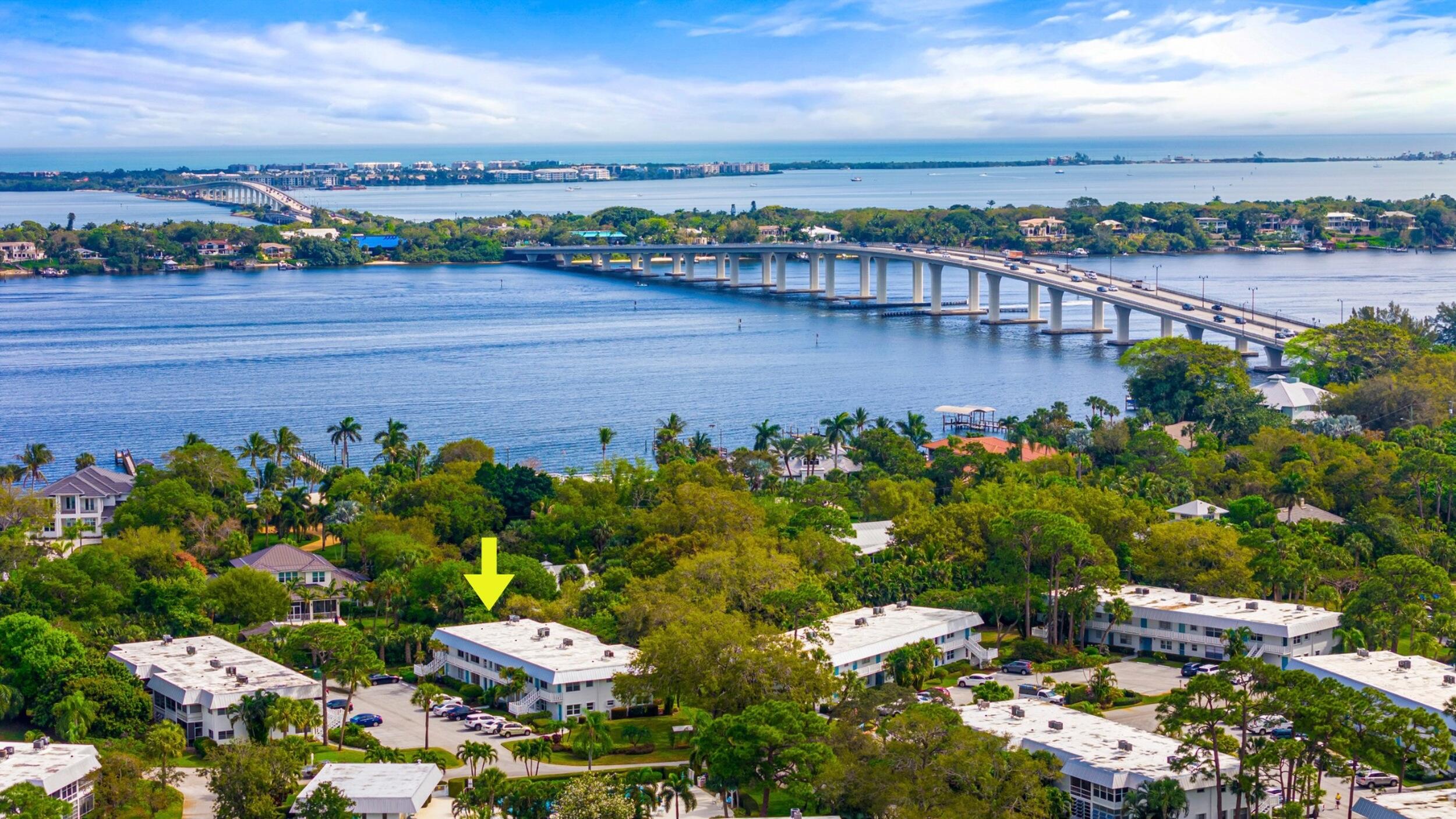 2929 Southeast Ocean Boulevard, Unit 10510 Stuart, FL 34996 - Photo 33 of 37 a view of a lake with a city