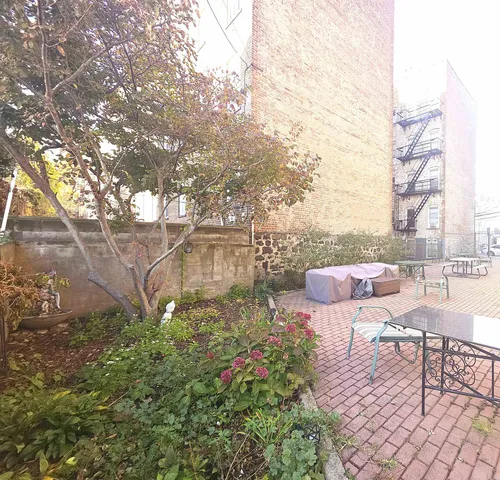 a view of a terrace with furniture