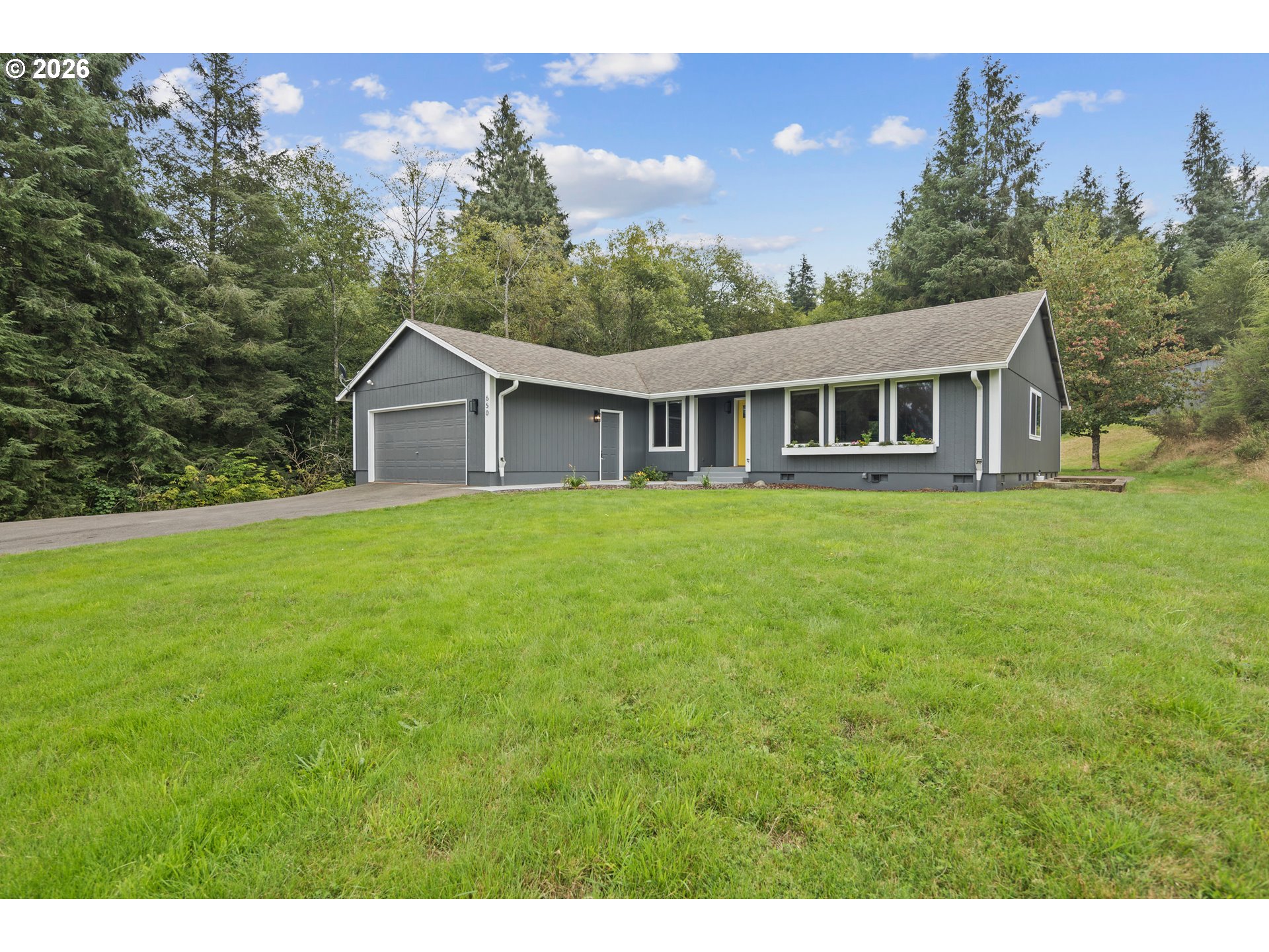 650 Marvin Road Tillamook, OR 97141 - Photo 2 of 48 a view of a house with a yard