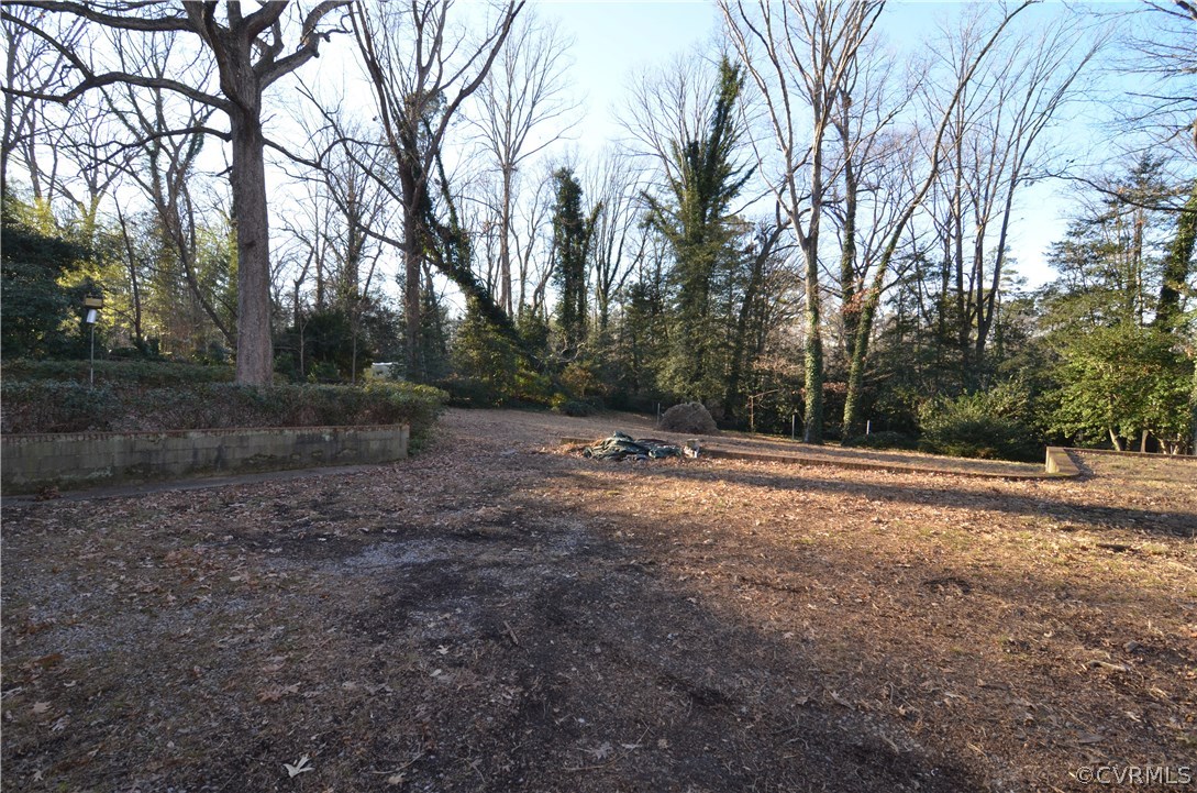 3308 Osborne Road Chester, VA 23831 - Photo 23 of 26 a backyard of a house with lots of green space