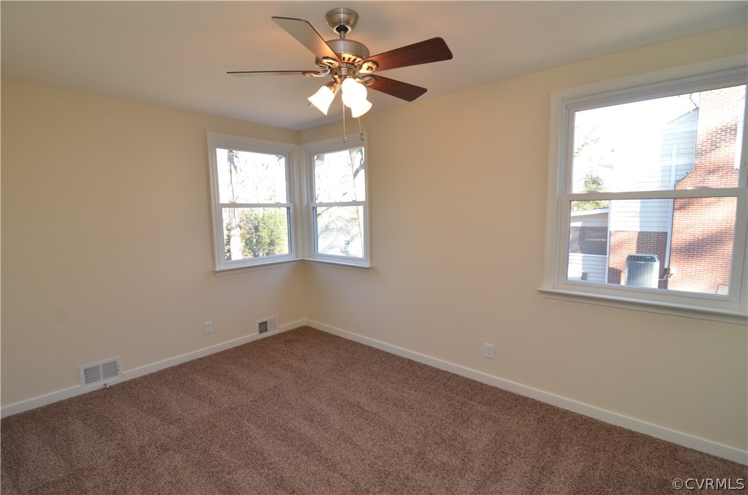 3308 Osborne Road Chester, VA 23831 - Photo 8 of 26 an empty room with a window