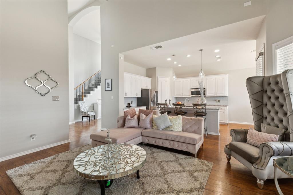 260 Dave Trail Prosper, TX 75078 - Photo 15 of 39 a living room with furniture kitchen view and a table