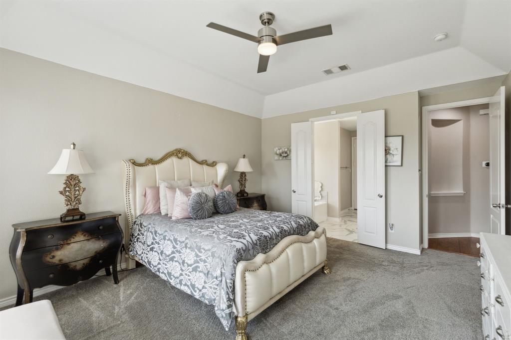 260 Dave Trail Prosper, TX 75078 - Photo 22 of 39 a bedroom with a bed and a chair