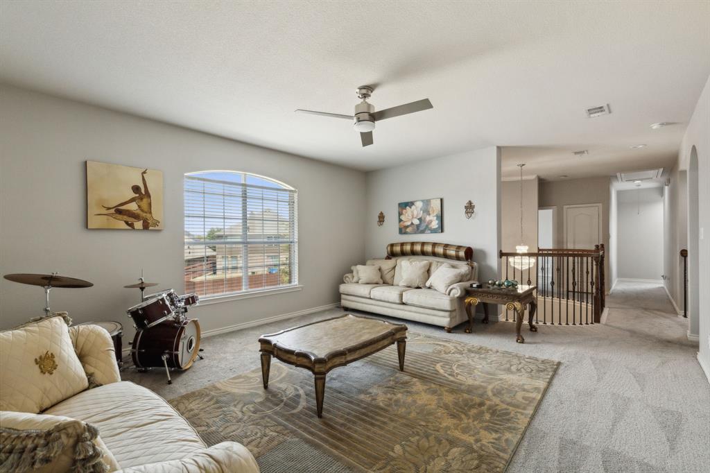 260 Dave Trail Prosper, TX 75078 - Photo 28 of 39 a living room with furniture and a table