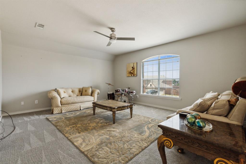 260 Dave Trail Prosper, TX 75078 - Photo 29 of 39 a living room with furniture and a wooden floor
