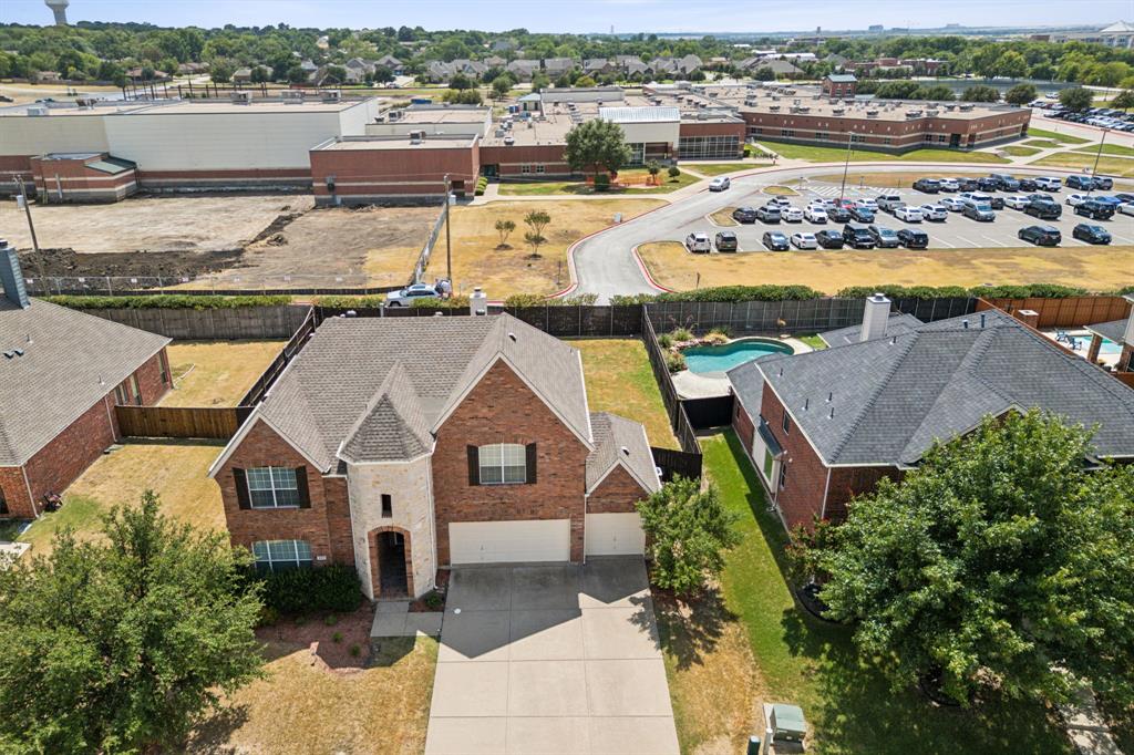 260 Dave Trail Prosper, TX 75078 - Photo 31 of 39 an aerial view of residential houses with outdoor space and ocean view