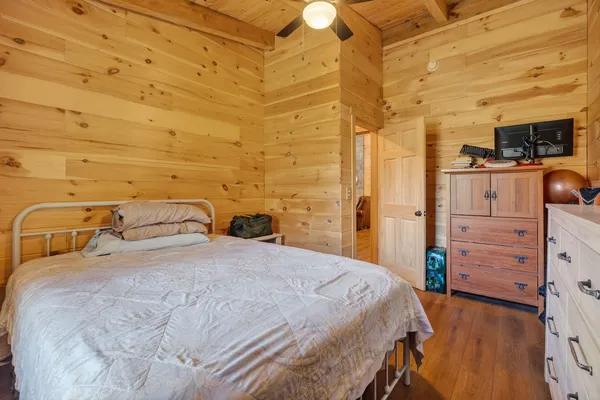 a bedroom with a bed and a cabinets