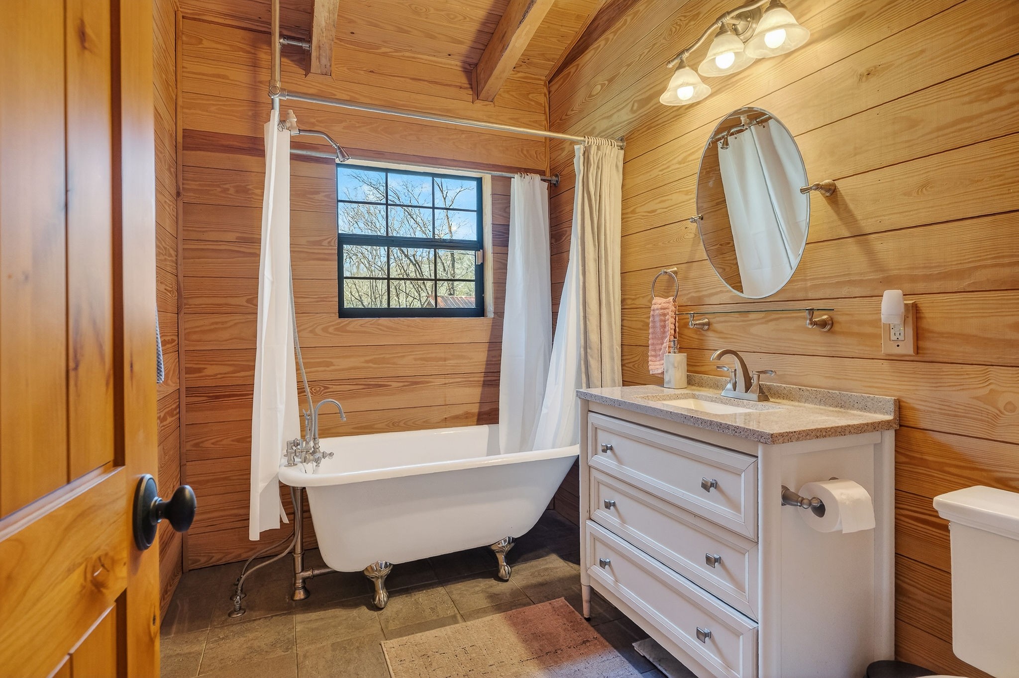 3331 Adamson Branch Road Liberty, TN 37095 - Photo 17 of 59 a bathroom with a sink mirror and a window