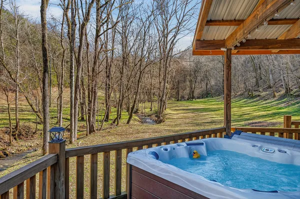 a view of a two chairs on the roof deck