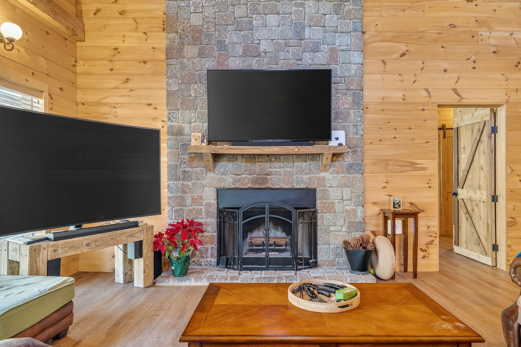 3331 Adamson Branch Road Liberty, TN 37095 - Photo 6 of 59 a living room with a fireplace a flat screen tv and a fireplace