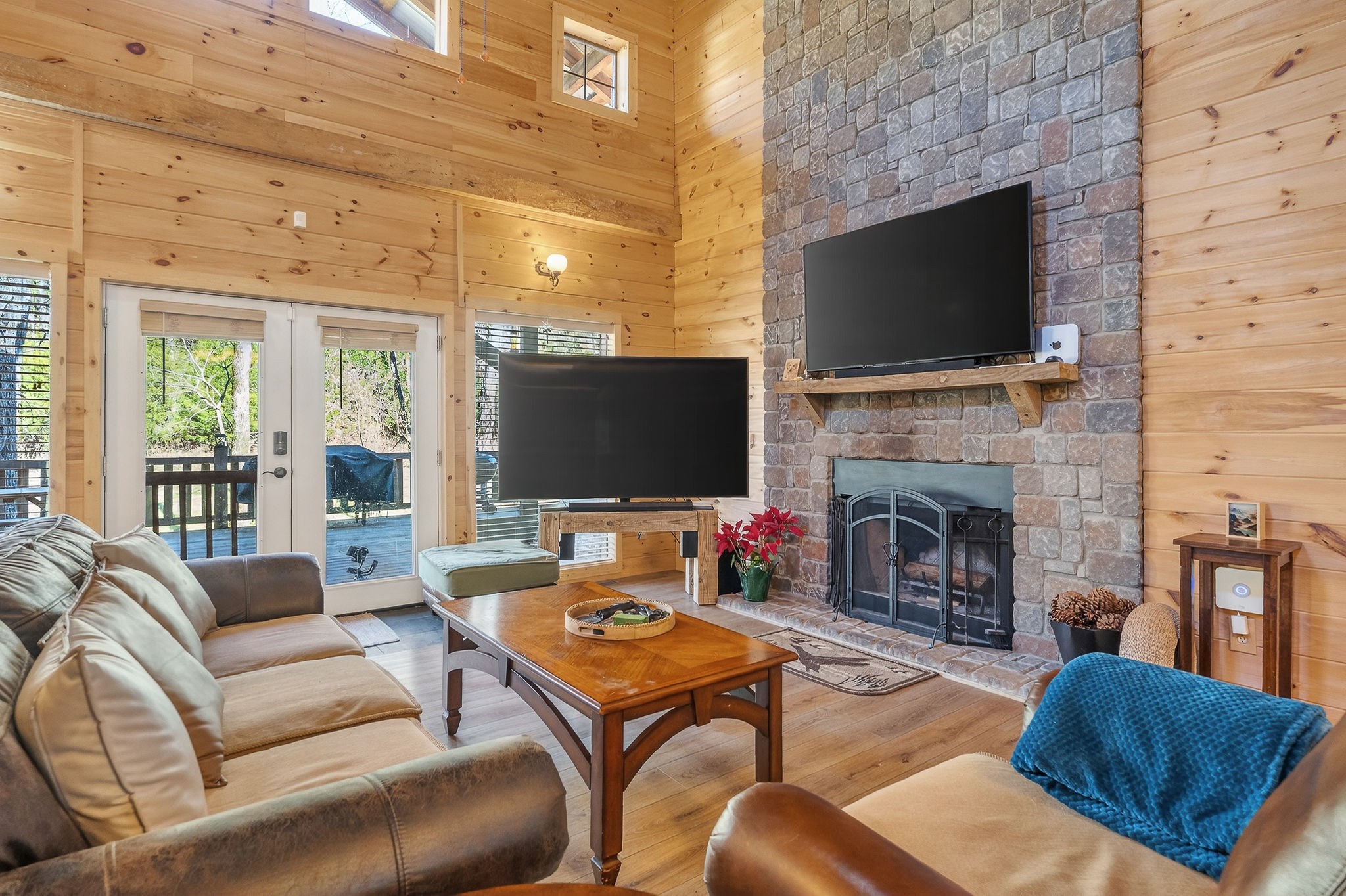 3331 Adamson Branch Road Liberty, TN 37095 - Photo 7 of 59 a living room with furniture a flat screen tv and a fireplace