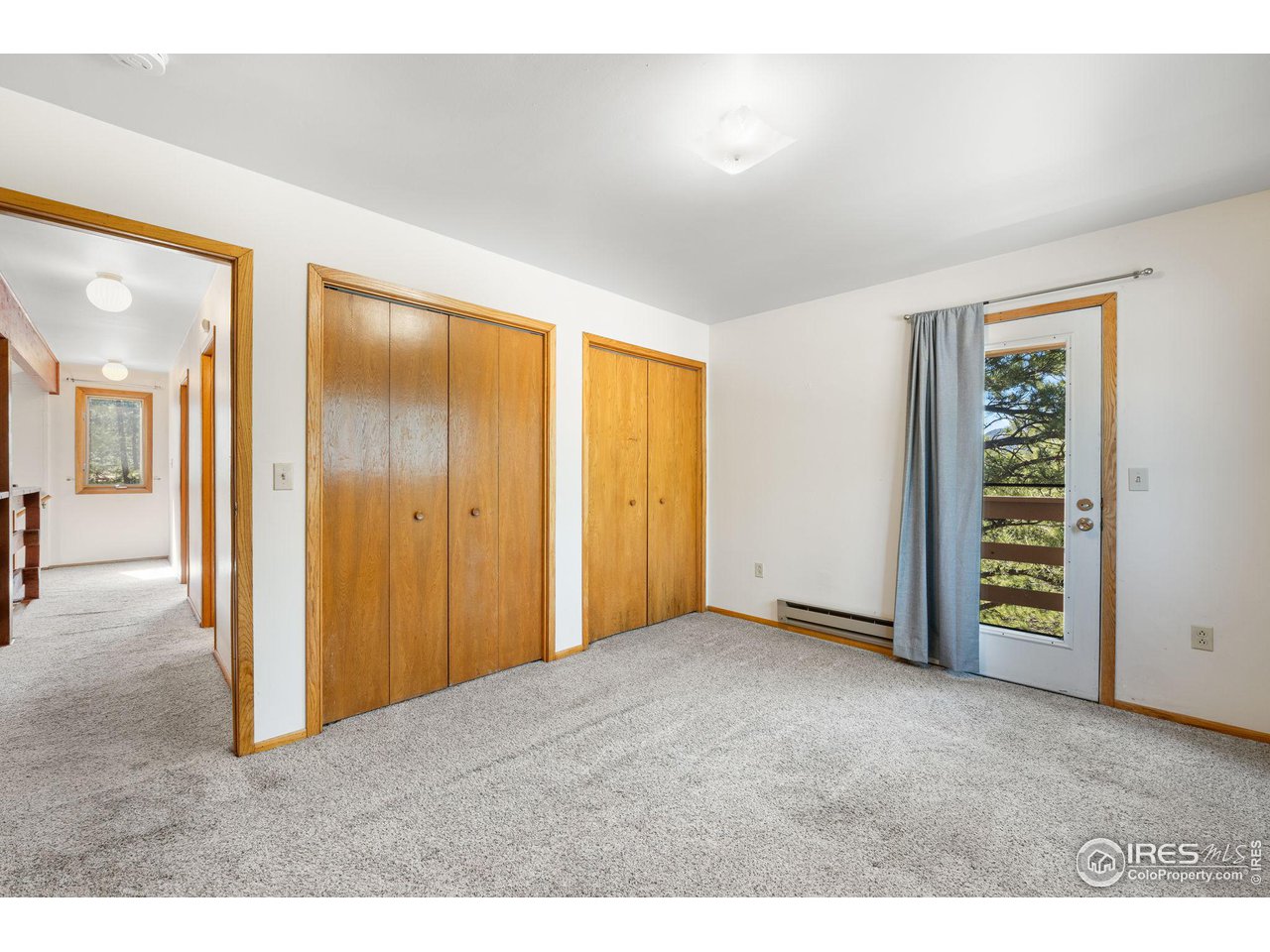 757 Peakview Road Boulder, CO 80302 - Photo 21 of 34 an empty room with closet and a bathroom
