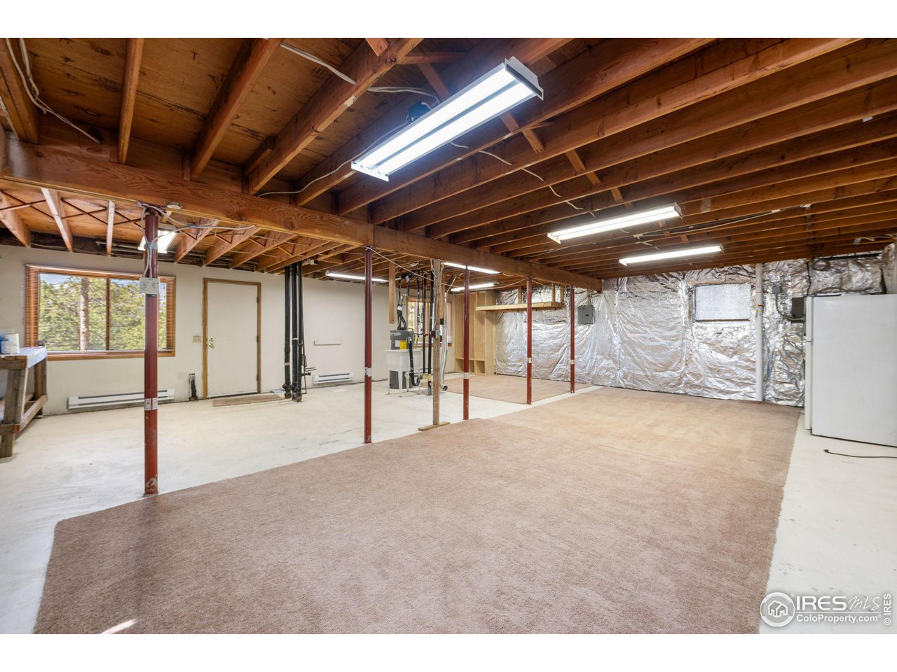 757 Peakview Road Boulder, CO 80302 - Photo 24 of 34 a view of an empty room with a garage