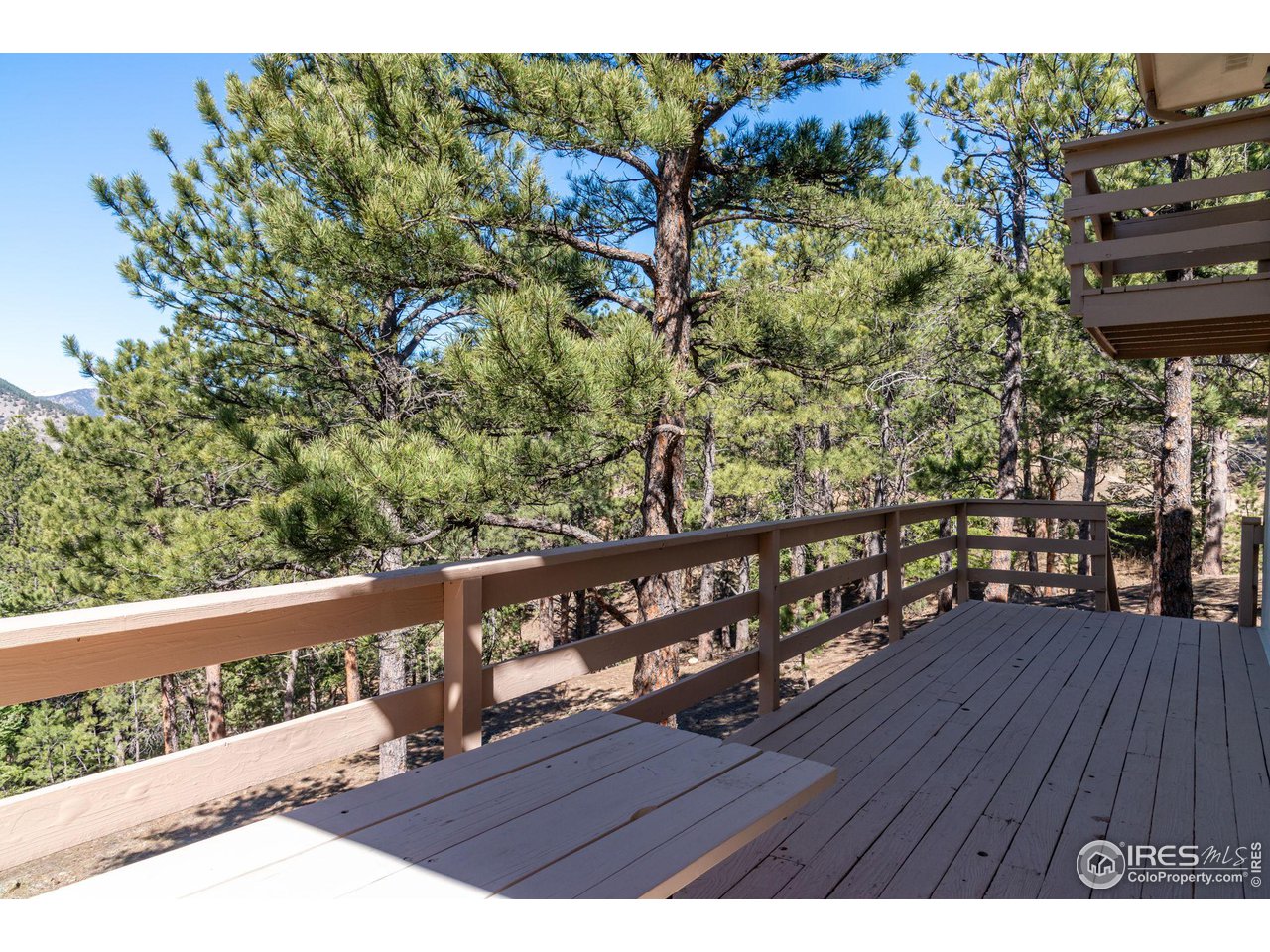 757 Peakview Road Boulder, CO 80302 - Photo 26 of 34 a view of balcony with wooden floor