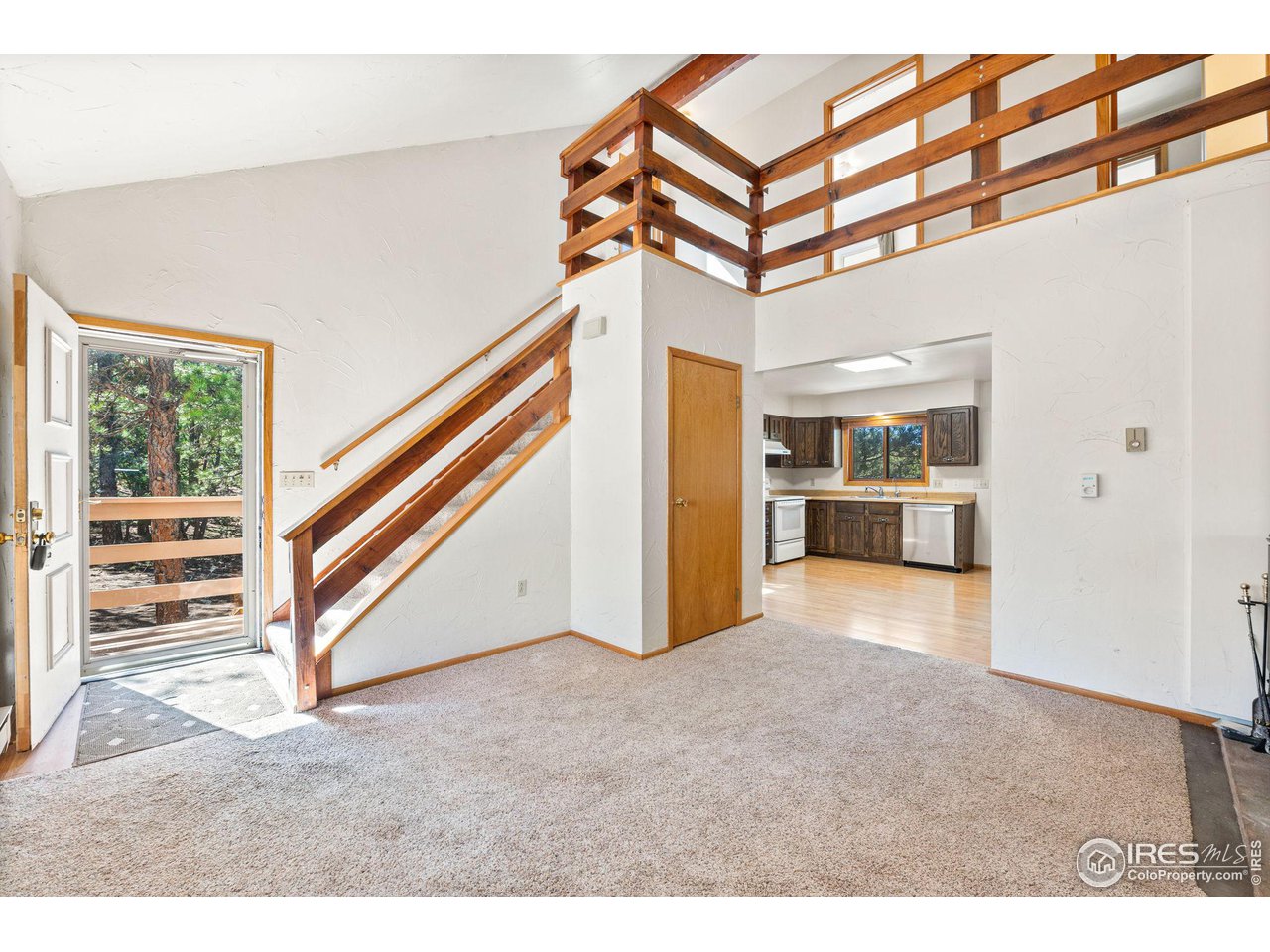757 Peakview Road Boulder, CO 80302 - Photo 5 of 34 a view of a livingroom with an empty space and a ceiling fan