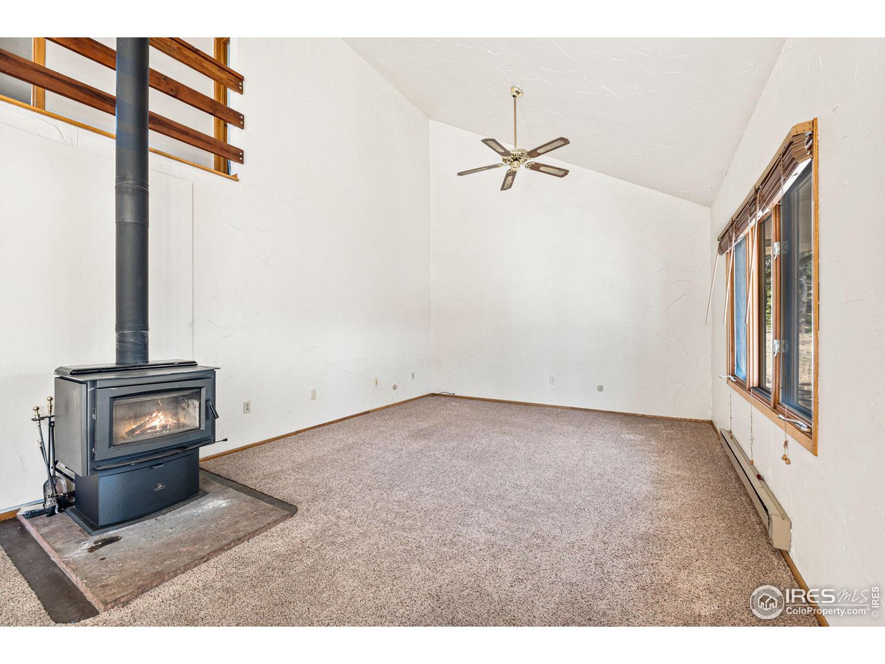 757 Peakview Road Boulder, CO 80302 - Photo 6 of 34 a view of a livingroom with wooden floor
