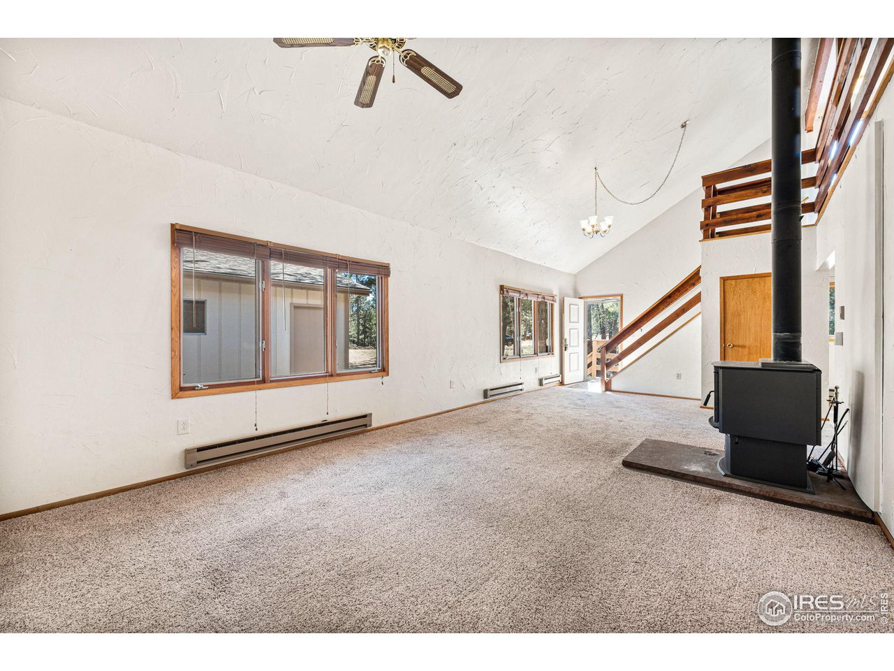 757 Peakview Road Boulder, CO 80302 - Photo 8 of 34 a view of an empty room with windows